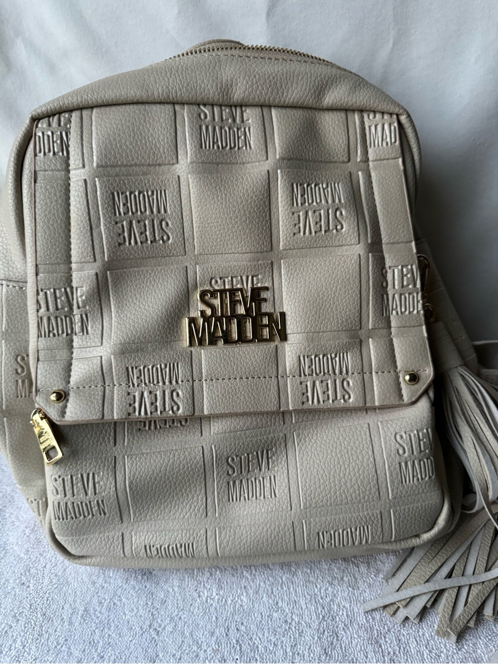 Steve Madden Cream Quilted Logo Backpack with Tassel